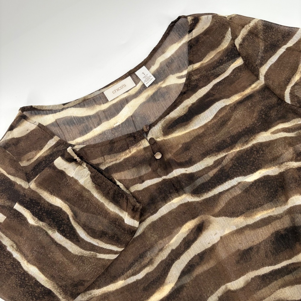 Chicos Womens Tunic Top Size 1 Brown Zebra Print Sheer Button Front
Smocked Hem‎